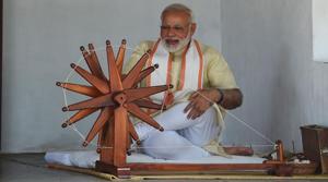 Prime Minister Narendra Modi spins a yarn on a charkha (spinning wheel) during his visit to Mahatma Gandhi's Sabarmati Ashram in Ahmedabad on Thursday.(AFP) Prime Minister Narendra Modi spins a yarn on a charkha (spinning wheel) during his visit to Mahatma Gandhi's Sabarmati Ashram in Ahmedabad on Thursday.(AFP)