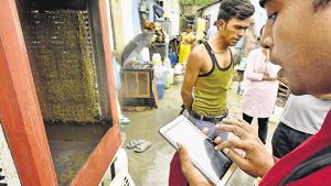 Workers from SDMC’s malaria department use a tablet to note down information at Kishangarh village near Vasant Kunj in New Delhi on Friday.(Vipin Kumar/HT File Photo) Workers from SDMC’s malaria department use a tablet to note down information at Kishangarh village near Vasant Kunj in New Delhi on Friday.(Vipin Kumar/HT File Photo)