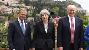 European Council President Donald Tusk, British Prime Minister Theresa May and U.S. President Donald Trump attend a flypast at San Domenico Palace Hotel on May 26, 2017 in Taormina , Italy.(Getty Images) European Council President Donald Tusk, British Prime Minister Theresa May and U.S. President Donald Trump attend a flypast at San Domenico Palace Hotel on May 26, 2017 in Taormina , Italy.(Getty Images)