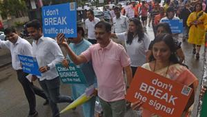 Residents took part in a walkathon organised by an NGO to create awareness on road safety in Baner.(HT Photo) Residents took part in a walkathon organised by an NGO to create awareness on road safety in Baner.(HT Photo)