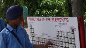 A student looks at a teaching tool for the periodic table of elements, installed in the science park at the school in Khosa Pando.(Parampreet Singh Narula/HT) A student looks at a teaching tool for the periodic table of elements, installed in the science park at the school in Khosa Pando.(Parampreet Singh Narula/HT)