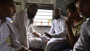 Junaid’s two brothers (first and second from right) travel on an EMU train at Ballabhgarh railway station in Haryana's Faridabad district .(Arun Sharma/HT Photo) Junaid’s two brothers (first and second from right) travel on an EMU train at Ballabhgarh railway station in Haryana's Faridabad district .(Arun Sharma/HT Photo)