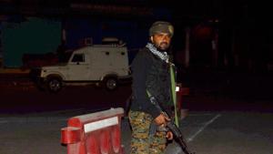 Security person stand guard after militants opened fire on the Amarnath Yatra in which seven pilgrims were killed 19 injured in Anantnag in Jammu and Kashmir on Monday.(PTI) Security person stand guard after militants opened fire on the Amarnath Yatra in which seven pilgrims were killed 19 injured in Anantnag in Jammu and Kashmir on Monday.(PTI)