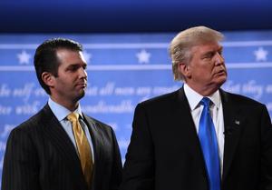 A file picture of US President Donald Trump with his son Donald Trump Jr (left). For the first time, Trump supporters have begun expressing concerns about the administration’s handling of the Russia imbroglio.(AFP)