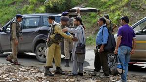 Security personnel frisk pilgrims and locals on their way to the Amarnath shrine after terrorists attacked a bus, killing seven people, at Nuwun base Camp in South Kashmir on Tuesday.(PTI Photo) Security personnel frisk pilgrims and locals on their way to the Amarnath shrine after terrorists attacked a bus, killing seven people, at Nuwun base Camp in South Kashmir on Tuesday.(PTI Photo)