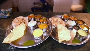 <p>Ever eaten food at a bhojanalaya in Delhi? Bhojnalayas are places that typically serve simple, easy on the pocket yet absolutely delicious vegetarian fare. The 100-year-old Annapurna Bhoj in Chandni Chowk is one such restaurant where traditional Indian thalis are served. What's interesting is that the food is cooked completely without garlic and onion and tastes just like home! </p>