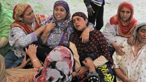 The wife and mother of Naik Mudassar Ahmad weep while waiting for his body in Buchoo village of Tral, 40kms from Srinagar, on Tuesday.(Waseem Andrabi/HT) The wife and mother of Naik Mudassar Ahmad weep while waiting for his body in Buchoo village of Tral, 40kms from Srinagar, on Tuesday.(Waseem Andrabi/HT)