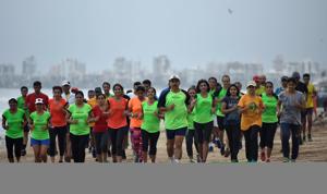 Runners taking part in the Hindustan Times Monsoon Marathon Challenge attend a training session on Tuesday.(Satish Bate/HT Photo)