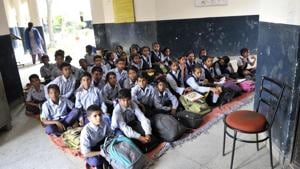 Students attend class in a corridor of their school. Many schools across India have become run-down versions of themselves. (HT File Photo) Students attend class in a corridor of their school. Many schools across India have become run-down versions of themselves. (HT File Photo)