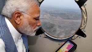 Prime Minister Narendra Modi flew over parts of northern Gujarat to survey flood-affected districts last week, prompting rivals to accuse him of bias.(PTI PHOTO) Prime Minister Narendra Modi flew over parts of northern Gujarat to survey flood-affected districts last week, prompting rivals to accuse him of bias.(PTI PHOTO)