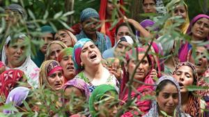 Relatives of a Kashmiri civilian mourn during his funeral at Begum Bagh in Pulwama, south of Srinagar, on Tuesday. Two civilians were killed and dozens injured when security forces fired on protester.(AFP) Relatives of a Kashmiri civilian mourn during his funeral at Begum Bagh in Pulwama, south of Srinagar, on Tuesday. Two civilians were killed and dozens injured when security forces fired on protester.(AFP)