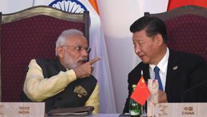 Indiam Prime Minister Narendra Modi (l) gestures while talking to China’s President Xi Jinping during a BRICS meeting in Goa laat year.(AFP file photo) Indiam Prime Minister Narendra Modi (l) gestures while talking to China’s President Xi Jinping during a BRICS meeting in Goa laat year.(AFP file photo)
