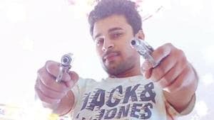 Deepak Kumar Malik has uploaded several photographs on his Facebook page posing with guns and other arms.(HT Photo) Deepak Kumar Malik has uploaded several photographs on his Facebook page posing with guns and other arms.(HT Photo)