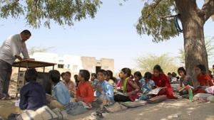Students attend class under a tree at a government school in Rajasthan.(HT file photo/Picture for representational purpose only) Students attend class under a tree at a government school in Rajasthan.(HT file photo/Picture for representational purpose only)