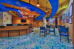 It looks like a trendy cafe, but this is one of the reception areas at the Mahajan Imaging Centre in Gurugram. The idea is to offer interiors that do not constantly remind people of a hospital environment, says co-founder Ritu Mahajan. It looks like a trendy cafe, but this is one of the reception areas at the Mahajan Imaging Centre in Gurugram. The idea is to offer interiors that do not constantly remind people of a hospital environment, says co-founder Ritu Mahajan.