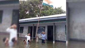 Four teachers and two students assemble to mark Independence Day in Naskara Lower Primary School in Dhuburi, Assam on August 15.(Joydev Roy) Four teachers and two students assemble to mark Independence Day in Naskara Lower Primary School in Dhuburi, Assam on August 15.(Joydev Roy)