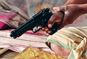 A still from the film Loktak Lairembee (Lady of the Lake, Manipuri) on a fisherman who suddenly gets hold of a gun by director Haobam Paban Kumar(Photos courtesy: IIC) A still from the film Loktak Lairembee (Lady of the Lake, Manipuri) on a fisherman who suddenly gets hold of a gun by director Haobam Paban Kumar(Photos courtesy: IIC)