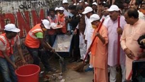 Uttar Pradesh chief minister Yogi Adityanath takes part in a cleanliness drive in Gorakhpur on Saturday.(HT Photo) Uttar Pradesh chief minister Yogi Adityanath takes part in a cleanliness drive in Gorakhpur on Saturday.(HT Photo)