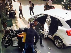 CCTV footage shows a 60-year-old man being kidnapped by two men in a car in Udaipur on Monday.(CCTV Footage.) CCTV footage shows a 60-year-old man being kidnapped by two men in a car in Udaipur on Monday.(CCTV Footage.)