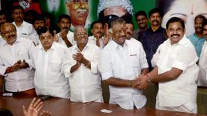 Tamil Nadu chief minister K Palaniswami (right) and deputy chief minister O Panneerselvam exchange greetings following the merger of their factions in Chennai on Monday.(PTI photo) Tamil Nadu chief minister K Palaniswami (right) and deputy chief minister O Panneerselvam exchange greetings following the merger of their factions in Chennai on Monday.(PTI photo)