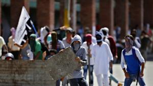 Masked Kashmiris participate in a protest in Srinagar, Indian controlled Kashmir on August 18.(AP File Photo/Representative image) Masked Kashmiris participate in a protest in Srinagar, Indian controlled Kashmir on August 18.(AP File Photo/Representative image)