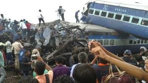 Railway police and local volunteers look for survivors in the upturned coaches of the Kalinga-Utkal Express after an accident near Khatauli in Uttar Pradesh. According to data-journalism website IndiaSpend, 333 people died in train derailments alone in the last three years.(AP File)