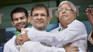 RJD chief Lalu Prasad Yadav (right) with rebel Janata Dal-United (JD-U) leader Sharad Yadav during the 'BJP bhagao, desh bachao' rally at Gandhi Maidan in Patna on Sunday. Lalu’s elder son Tej Partap Yadav is also seen.(PTI) RJD chief Lalu Prasad Yadav (right) with rebel Janata Dal-United (JD-U) leader Sharad Yadav during the 'BJP bhagao, desh bachao' rally at Gandhi Maidan in Patna on Sunday. Lalu’s elder son Tej Partap Yadav is also seen.(PTI)