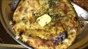 <p>Amritsari kulcha is not the kind of kulcha that you get in almost every nook and corner of Delhi. For one, it's cooked in a tandoor. Two, it is stuffed. And three, it is smeared with butter. The flour is kneaded with a bit of curd and baking soda, which makes it rise when it is being baked. And, thankfully, this is a dish that is being sold in some outlets in Delhi now.</p>