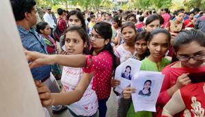 Aspirants check seating arrangements before a NEET examination in Bhopal recently. The petition filed in the Supreme Court alleged that the new system favours urban students over rural ones.(PTI File) Aspirants check seating arrangements before a NEET examination in Bhopal recently. The petition filed in the Supreme Court alleged that the new system favours urban students over rural ones.(PTI File)