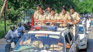 Cops keeping vigil during rallies taken out by various student outfits on the last day of campaigning at Panjab University on Tuesday.(Karun Sharma/HT) Cops keeping vigil during rallies taken out by various student outfits on the last day of campaigning at Panjab University on Tuesday.(Karun Sharma/HT)