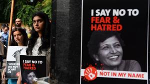 Demonstrators hold placards with the photograph of Gauri Lankesh during a 'Not In My Name' protest in New Delhi on September 7, 2017.(AFP) Demonstrators hold placards with the photograph of Gauri Lankesh during a 'Not In My Name' protest in New Delhi on September 7, 2017.(AFP)
