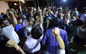 Students and supporters shout slogans during the DUSU elections Counting 2017 at JNU Campus in New Delhi on Saturday.(Arun Sharma/HT Photo) Students and supporters shout slogans during the DUSU elections Counting 2017 at JNU Campus in New Delhi on Saturday.(Arun Sharma/HT Photo)