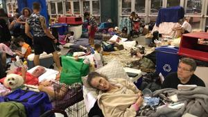 Florida residents take shelter from Hurricane Irma inside the Germain Arena in Estero.(REUTERS) Florida residents take shelter from Hurricane Irma inside the Germain Arena in Estero.(REUTERS)