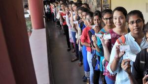 Students queue up to cast their votes for the Delhi University Students' Union Elections (DUSU) at Miranda House college in North Campus of Delhi University in New Delhi on Tuesday.(PTI Photo) Students queue up to cast their votes for the Delhi University Students' Union Elections (DUSU) at Miranda House college in North Campus of Delhi University in New Delhi on Tuesday.(PTI Photo)