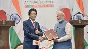 Prime Minister Narendra Modi and his Japanese counterpart Shinzo Abe shake hands after signing agreements between the two countries on Thursday.(Twitter/Raveesh) Prime Minister Narendra Modi and his Japanese counterpart Shinzo Abe shake hands after signing agreements between the two countries on Thursday.(Twitter/Raveesh)