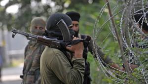 Policemen stand guard during a search operation in Srinagar after three militants were killed in a gunfight with security forces in Tral.(Waseem Andrabi /HT File Photo) Policemen stand guard during a search operation in Srinagar after three militants were killed in a gunfight with security forces in Tral.(Waseem Andrabi /HT File Photo)