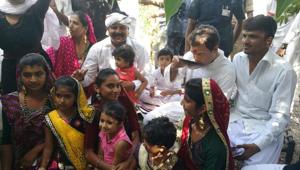 Rahul Gandhi sips tea with an Ahir family at Hanjrapar village on Monday during the first day of his Navsarjan Yatra. (HT Photo) Rahul Gandhi sips tea with an Ahir family at Hanjrapar village on Monday during the first day of his Navsarjan Yatra. (HT Photo)