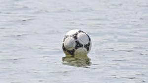 A football game in Romania was abandoned after all the match balls had been hit into a nearby river.(Twitter) A football game in Romania was abandoned after all the match balls had been hit into a nearby river.(Twitter)