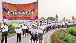 People take out a Swachhata Marathon in Kashi on Monday. People take out a Swachhata Marathon in Kashi on Monday.