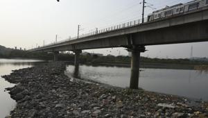 A temporary road that had come up on the river bed near Yamuna Bank Metro Station was demolished by DDA official a day after HT published the report on September 1. The road has now resurfaced.(Sushil Kumar / HT Photo) A temporary road that had come up on the river bed near Yamuna Bank Metro Station was demolished by DDA official a day after HT published the report on September 1. The road has now resurfaced.(Sushil Kumar / HT Photo)