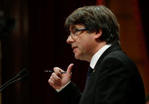Catalan president Carles Puigdemont speaks in the Catalonian regional parliament in Barcelona on October 10, 2017.(Reuters) Catalan president Carles Puigdemont speaks in the Catalonian regional parliament in Barcelona on October 10, 2017.(Reuters)