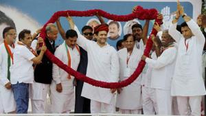 Congress workers felicitate party vice president Rahul Gandhi during a public meeting at Khatraj village of Kheda district in Gujarat on Monday.(PTI) Congress workers felicitate party vice president Rahul Gandhi during a public meeting at Khatraj village of Kheda district in Gujarat on Monday.(PTI)
