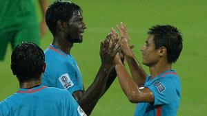 Rowllin Borges of Indian national football team (C) celebrates with teammates after scoring the opening goal in their AFC Asian Cup qualifier football match vs Macau at the Sree Kanteerava Stadium in Bangalore on Wednesday. Get final football score and highlights of the India vs Macau match here(AFP) Rowllin Borges of Indian national football team (C) celebrates with teammates after scoring the opening goal in their AFC Asian Cup qualifier football match vs Macau at the Sree Kanteerava Stadium in Bangalore on Wednesday. Get final football score and highlights of the India vs Macau match here(AFP)