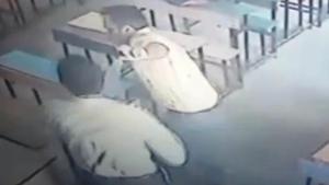A video grab taken from the CCTV footage A video grab taken from the CCTV footage