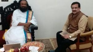 UP Shia Central Waqf Board chief Waseem Rizvi with Art of Living founder Sri Sri Ravishankar on Tuesday.(ANI Twitter) UP Shia Central Waqf Board chief Waseem Rizvi with Art of Living founder Sri Sri Ravishankar on Tuesday.(ANI Twitter)