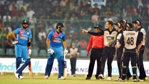 New Delhi: India's Rohit Sharma and Virat Kohli having a words with New Zealand players ,waits for reply of dismissal of Rohit Sharma during the first T20 match at Feroz Shah Kotla Stadium in New Delhi, on Wednesday. PTI Photo by Manvender Vashist (PTI11_1_2017_000208a)(PTI) New Delhi: India's Rohit Sharma and Virat Kohli having a words with New Zealand players ,waits for reply of dismissal of Rohit Sharma during the first T20 match at Feroz Shah Kotla Stadium in New Delhi, on Wednesday. PTI Photo by Manvender Vashist (PTI11_1_2017_000208a)(PTI)
