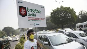 A boy wears a mask and holds a placard to address the alarming air pollution levels in the national capital.(Burhaan Kinu/HT file) A boy wears a mask and holds a placard to address the alarming air pollution levels in the national capital.(Burhaan Kinu/HT file)