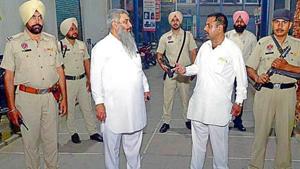 Shiv Sena state chairman Sudhir Kumar Suri (L) and chief Jai Gopal Lali with security personnel in Amritsar on Monday.(Sameer Sehgal/HT) Shiv Sena state chairman Sudhir Kumar Suri (L) and chief Jai Gopal Lali with security personnel in Amritsar on Monday.(Sameer Sehgal/HT)