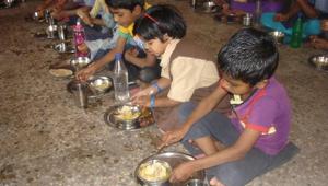 Students having their midday meal. The midday meal is the world’s biggest lunch programme aimed at promoting education and fighting malnutrition.(HT Photo) Students having their midday meal. The midday meal is the world’s biggest lunch programme aimed at promoting education and fighting malnutrition.(HT Photo)