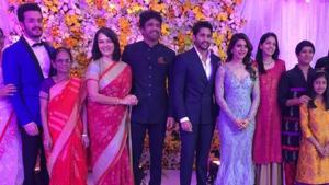 Akhil Akkineni, Amala, Nagarjuna, Naga Chaitanya and Samantha Akkineni at the wedding reception. Akhil Akkineni, Amala, Nagarjuna, Naga Chaitanya and Samantha Akkineni at the wedding reception.